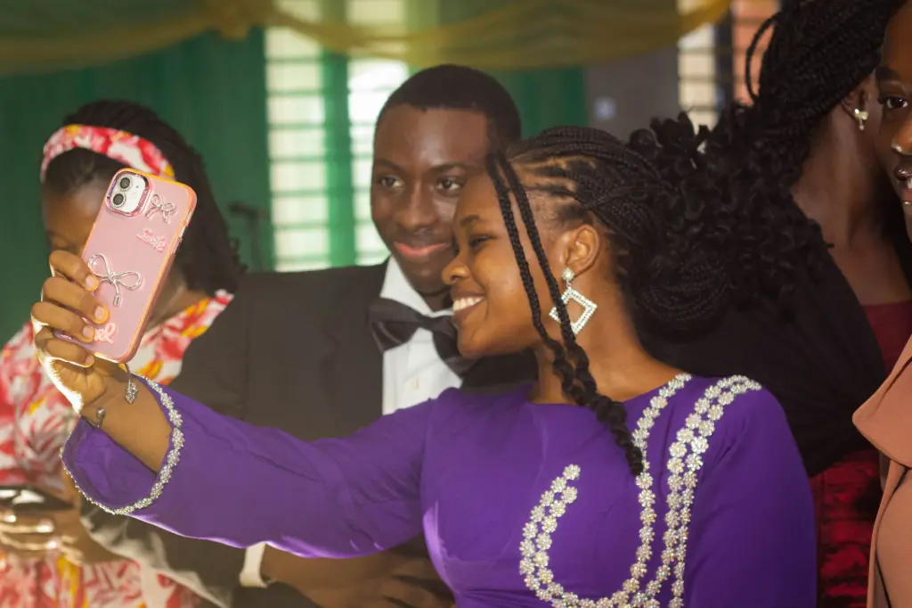 A boy and a girl taking a selfie together