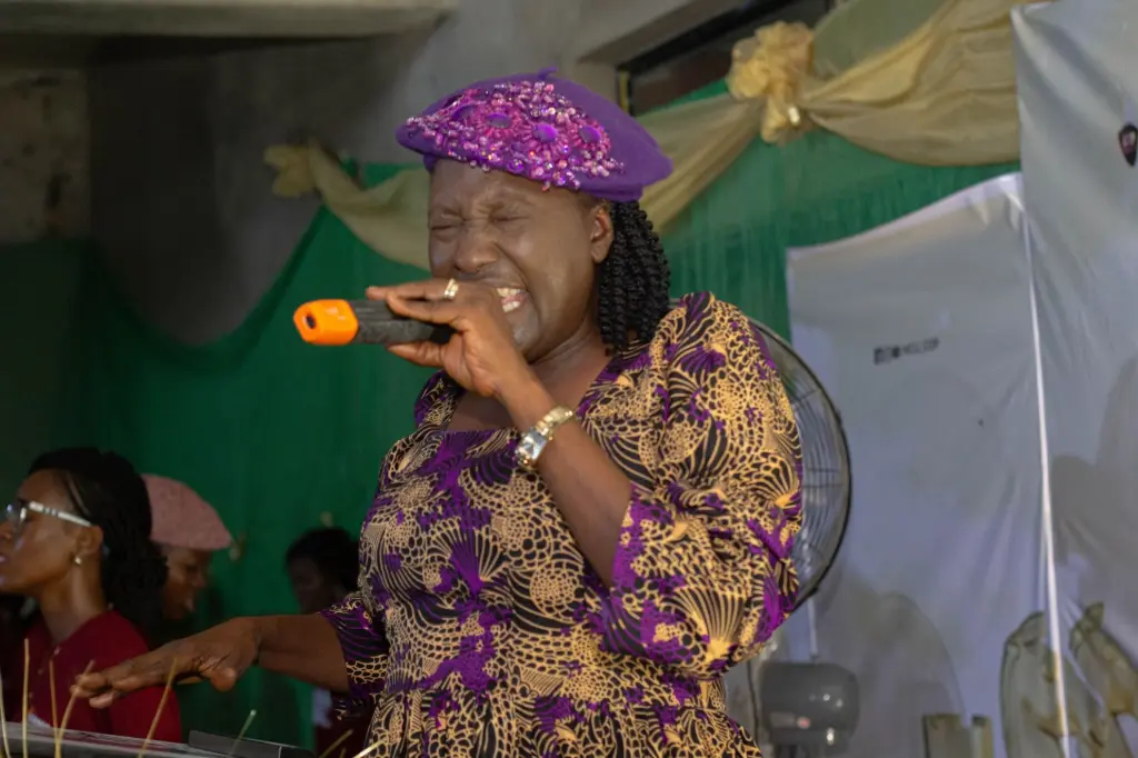 A woman preaching during Sunday service