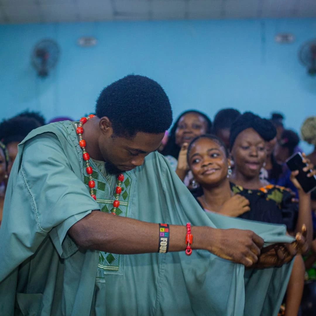 Boy dancing during Sunday service at Chapel of Praise